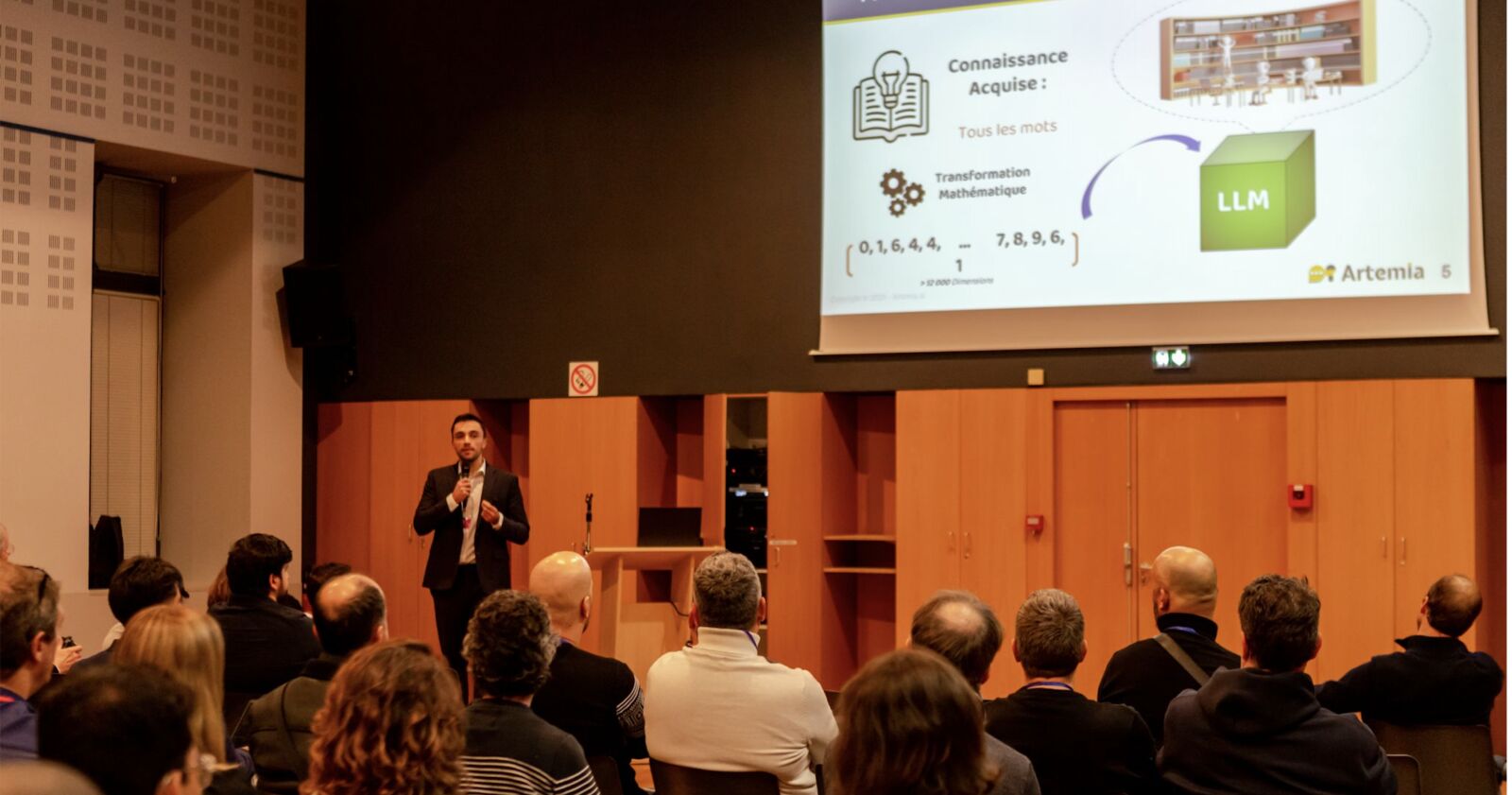 Une conférence Artemia sur l’IA générative devant une salle de dirigeants